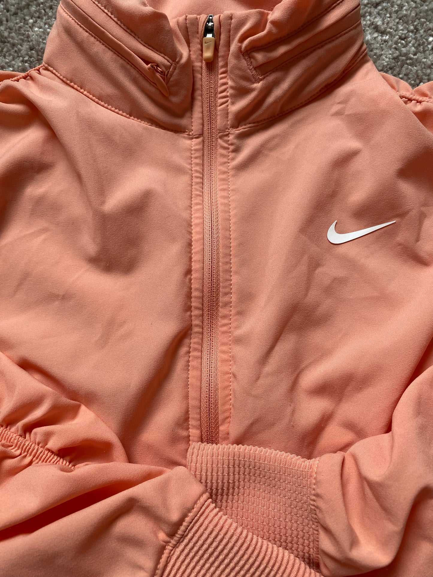 NIKE Girls Peach Jacket with Ruched Sleeves and Hidden Hood age 8-10